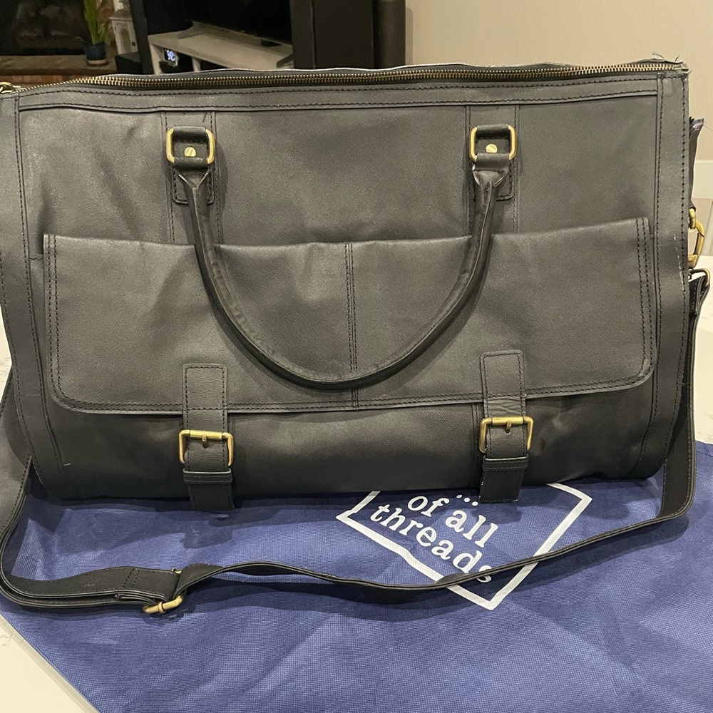Of All Threads overnight bag with suit jacket garment bag